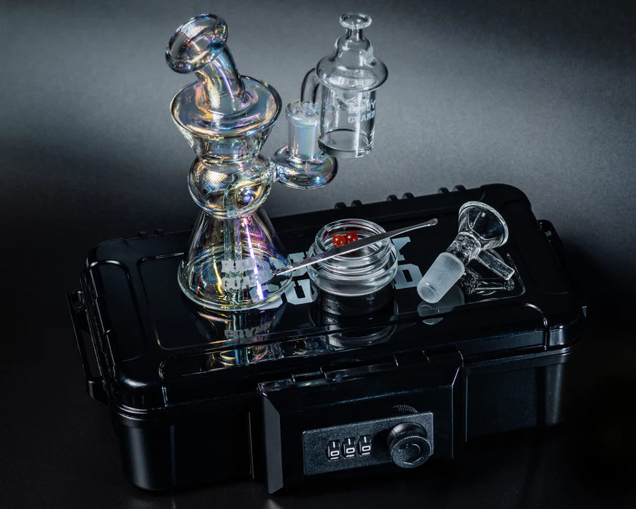 Buddy Guard Clear Rig set on a black case with a dark background